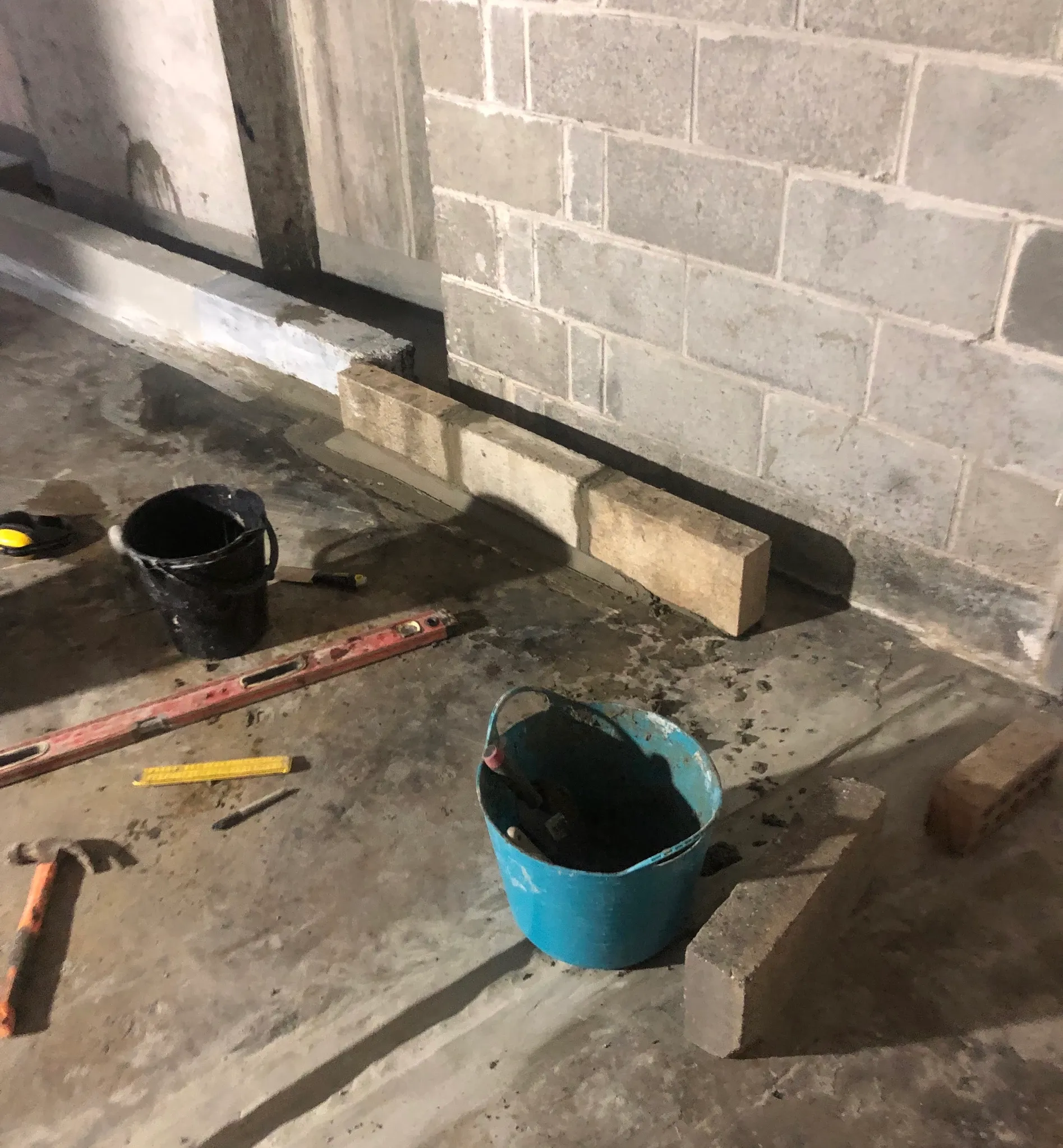 Basement Spoon Drain Installation