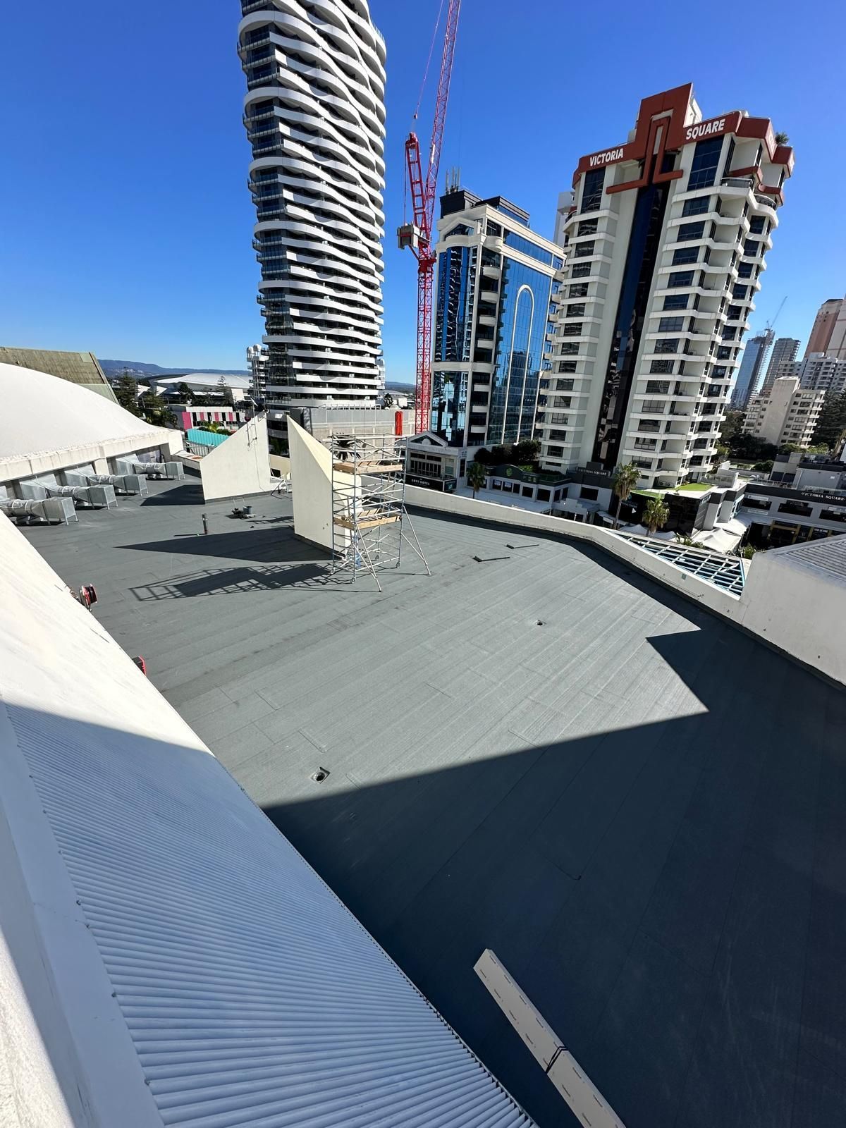 Podium remedial waterproofing at The Oasis Shopping Centre, Broadbeach QLD rooftop membrane upgrade