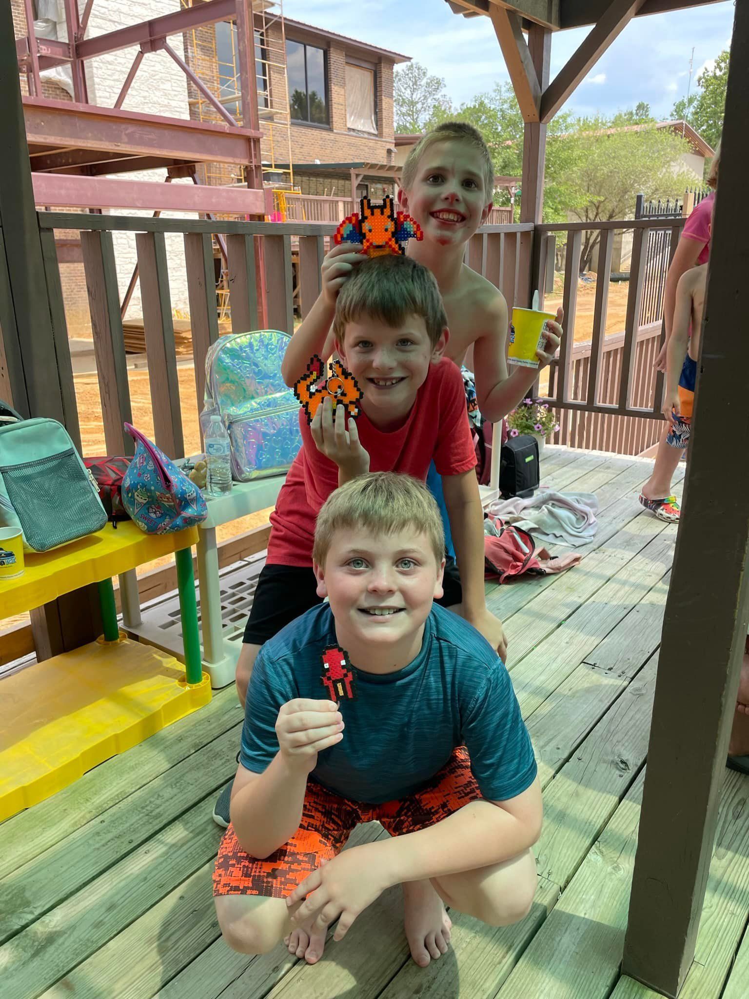 Kids Wearing Green Shirt on a Playground — Tyler, TX — Stepping Stone School