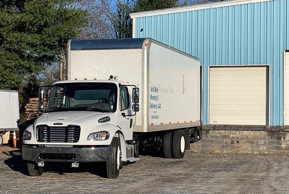 Movers Unloading Furniture — Hudson, NC — In & Out Moving & Delivery, LLC