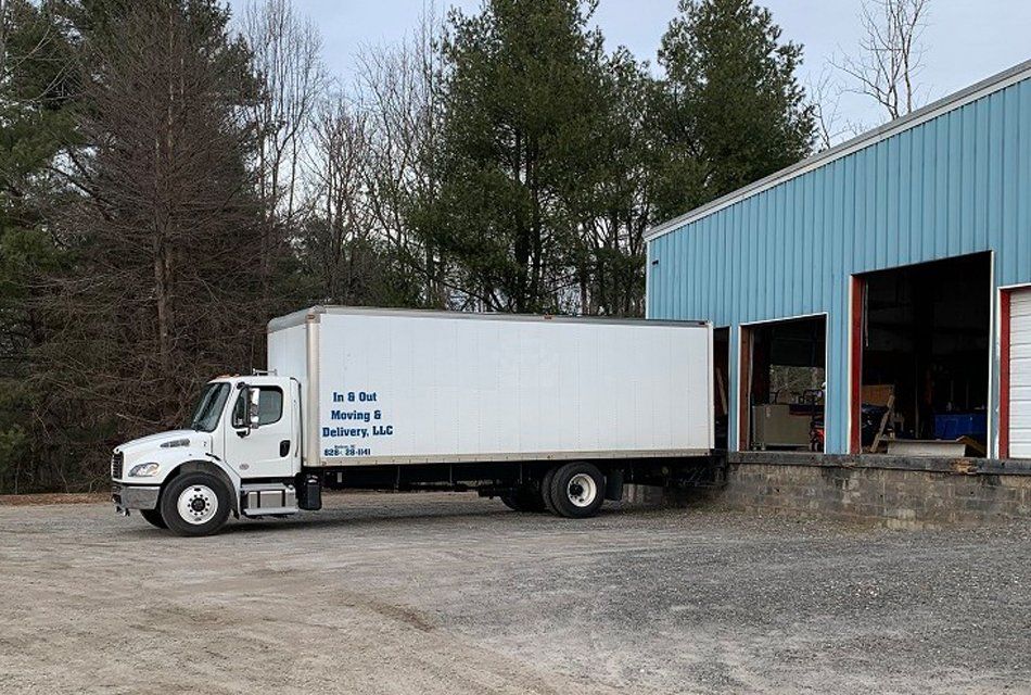 Forklift with Large Box — Hudson, NC — In & Out Moving & Delivery, LLC