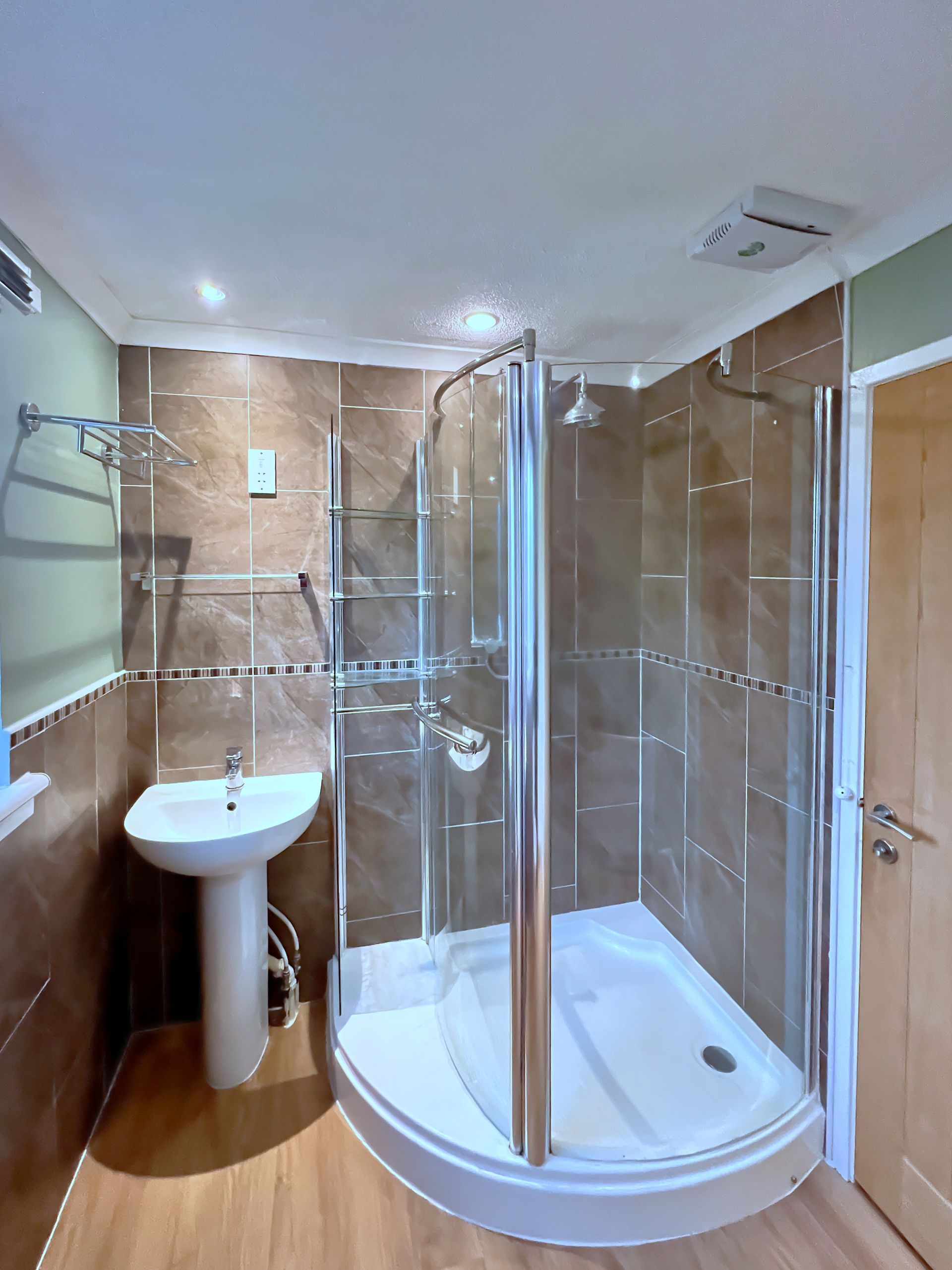An old bathroom with a sink , a toilette and a bath.