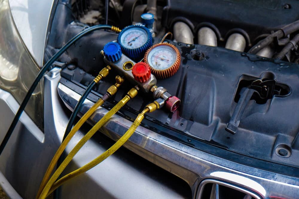 A Close Up of a Car Engine With a Bunch of Gauges on It — Steve's Service Centre in Albury, NSW