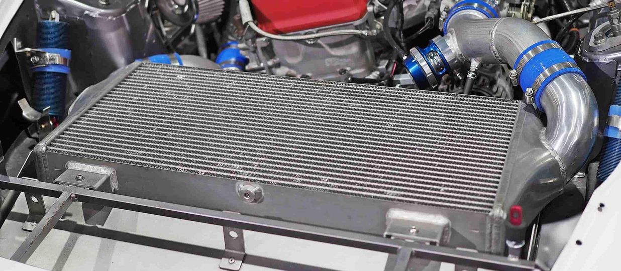 A Close Up of a Car Engine With a Radiator — Steve's Service Centre in Albury, NSW 