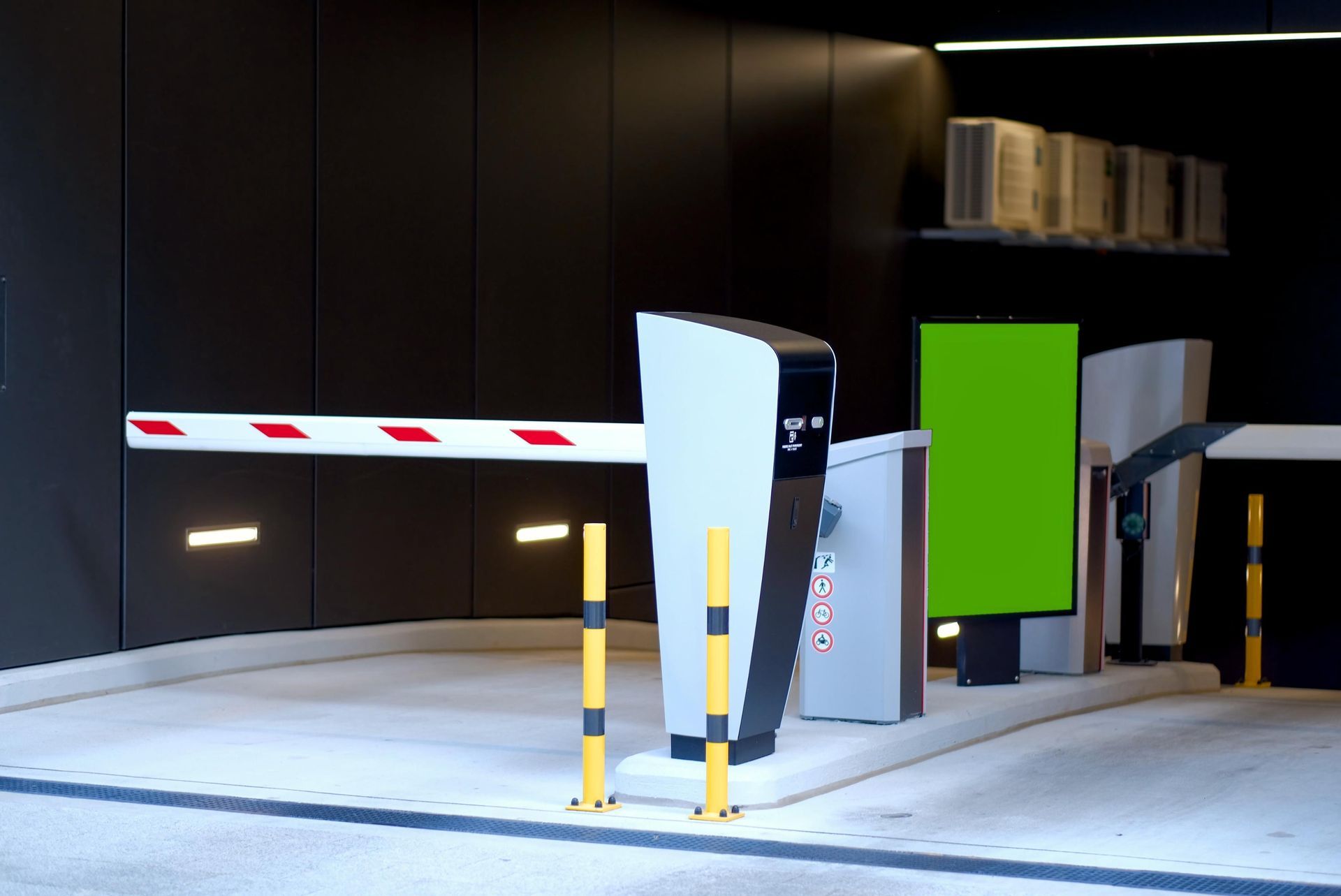 A living room with two couches, a fireplace, and a ceiling fan.
