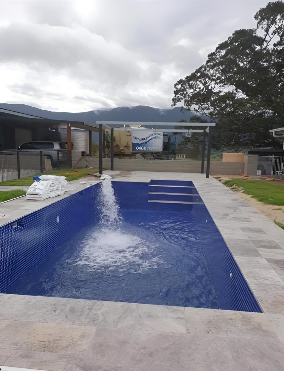 Large Swimming Pool With a Fountain — Gary Arnold Water Supplies in Murwillumbah, NSW