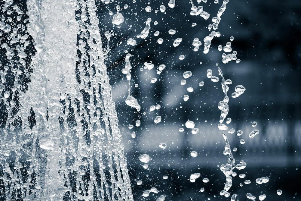 A Close Up Of A Water Fountain With Bubbles Coming Out Of It — Gary Arnold Water Supplies in Uki, NSW