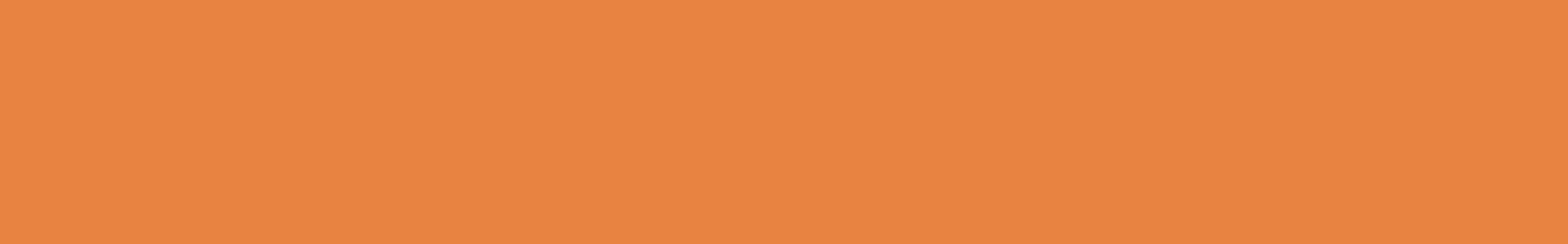 A close up of a plain orange background.