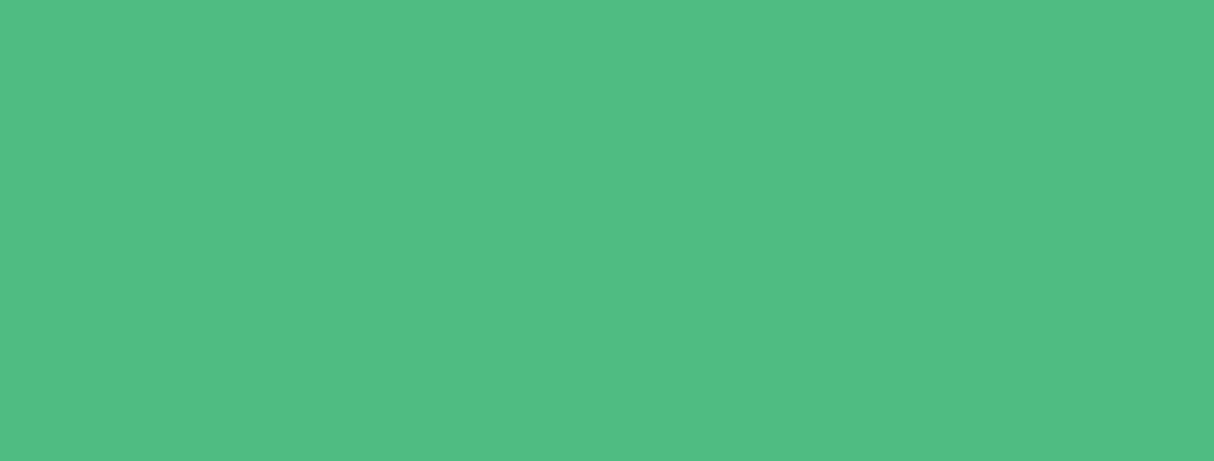 A close up of a green background with no texture.