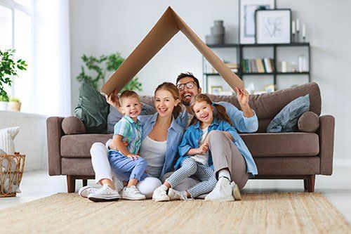 Happy Family In Their New House