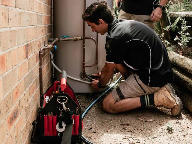 Plumber Installing Water Heater - Plumbing Services in Nelson Bay, NSW