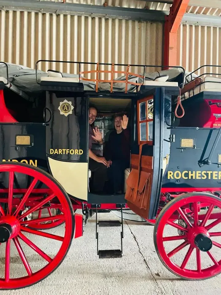 A horse drawn carriage with the word rochester on it