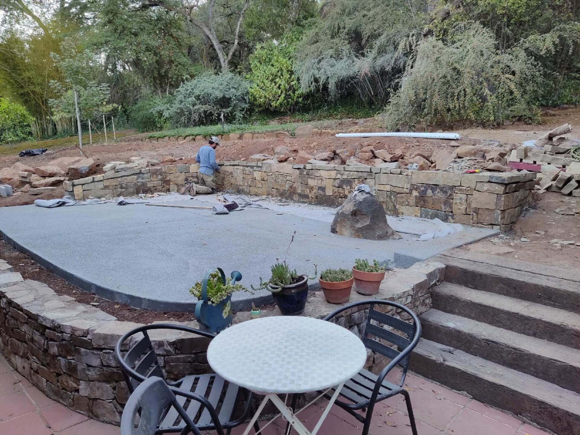 Concrete patio with retaining wall — Santa Rosa, CA — Santana Concrete
