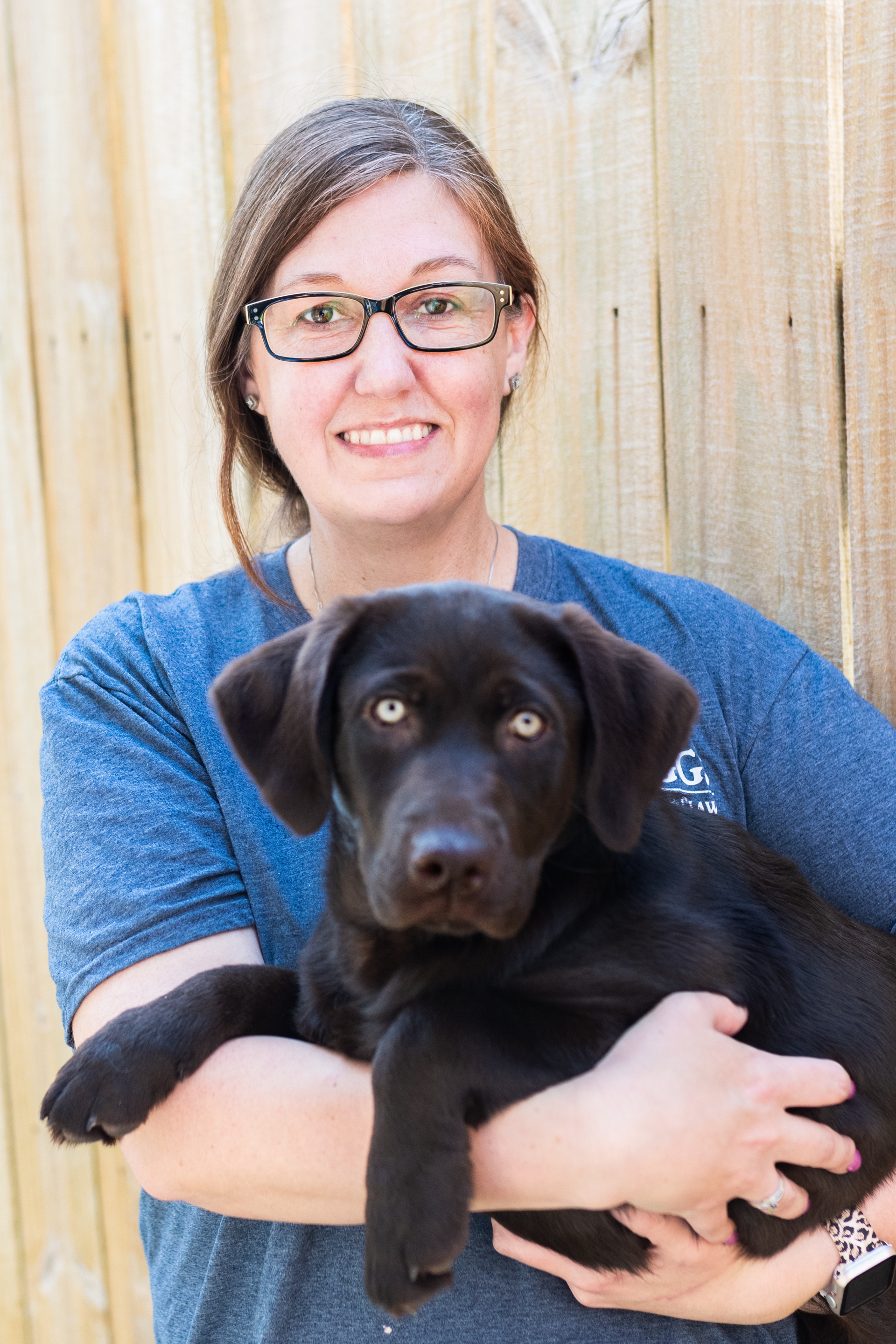 Nicole - Kennel Manager with black lab