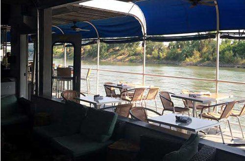 A view of the seating at Crawdad's on the River on the Sacramento River.