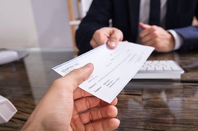 Payroll Services — Man Handling Check in Oklahoma City, OK