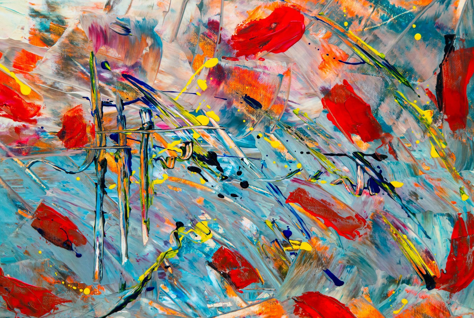 A close up of a colorful painting with a lot of brush strokes.