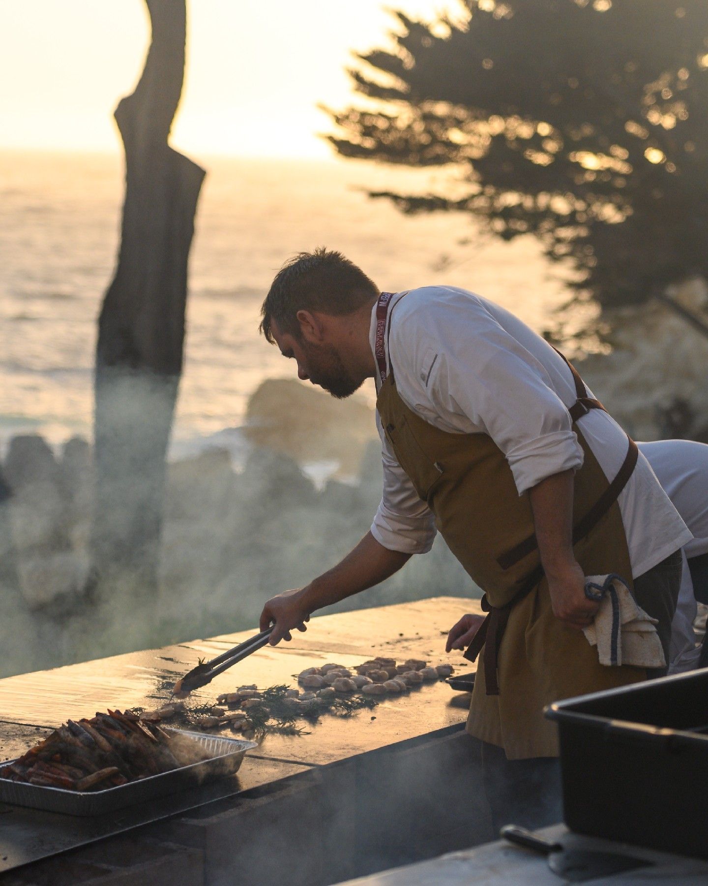 Chef prepairing a dish at a food and wine event