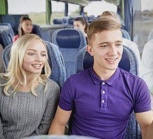 couple travelling in a minibus