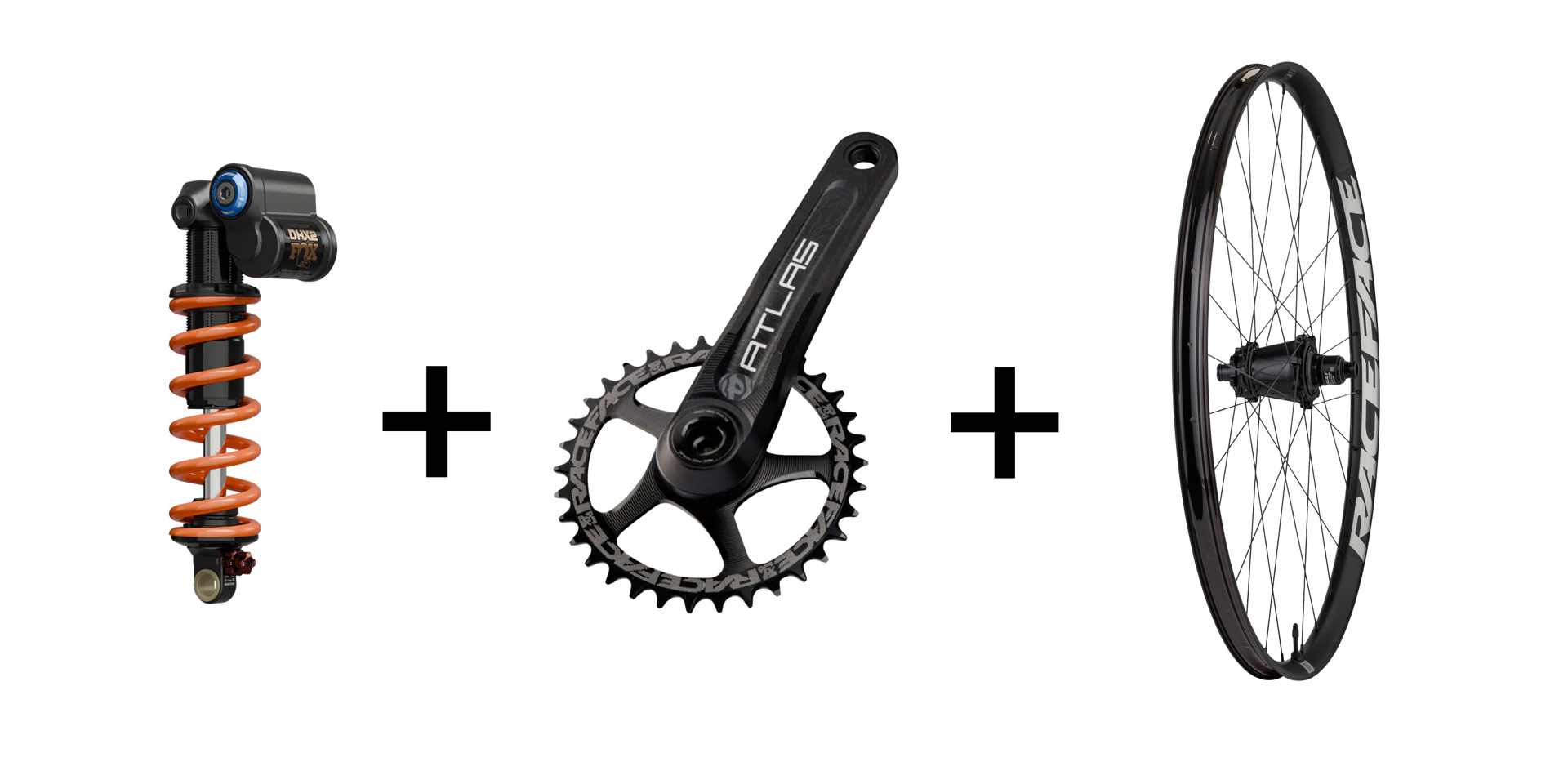 Components of a mountain bike: rear shock, crankset, and wheel.