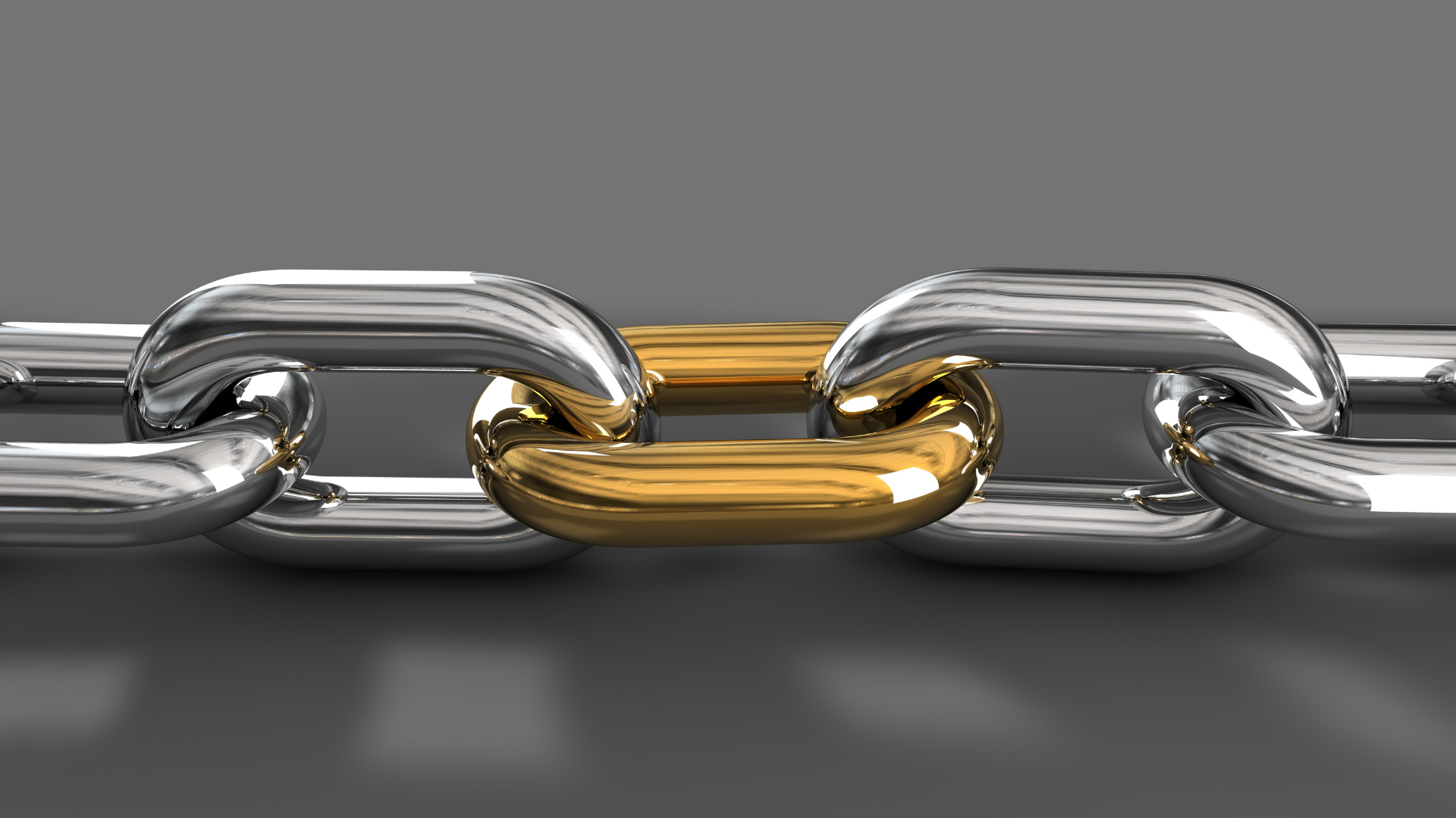 Chaîne en argent avec un maillon en or.