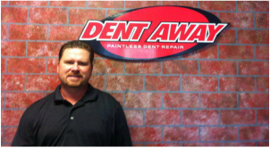 Man smiling in front of 