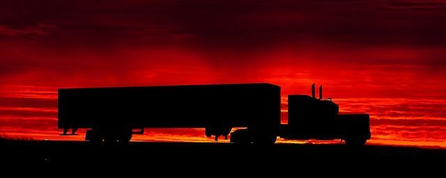 Trucking with the sun in the background