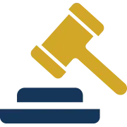 A judge 's gavel is sitting on top of a blue block.