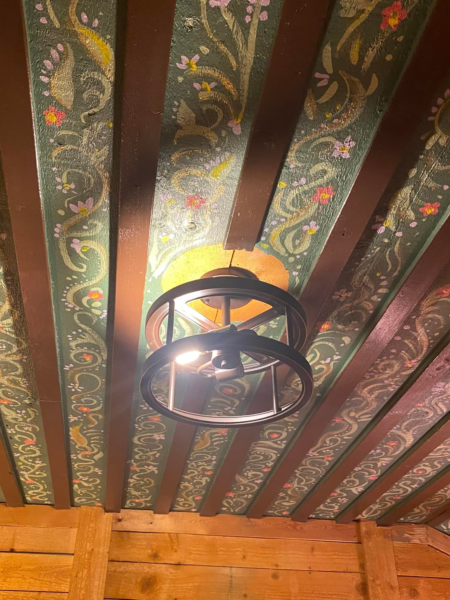 A chandelier is hanging from the ceiling of a building.