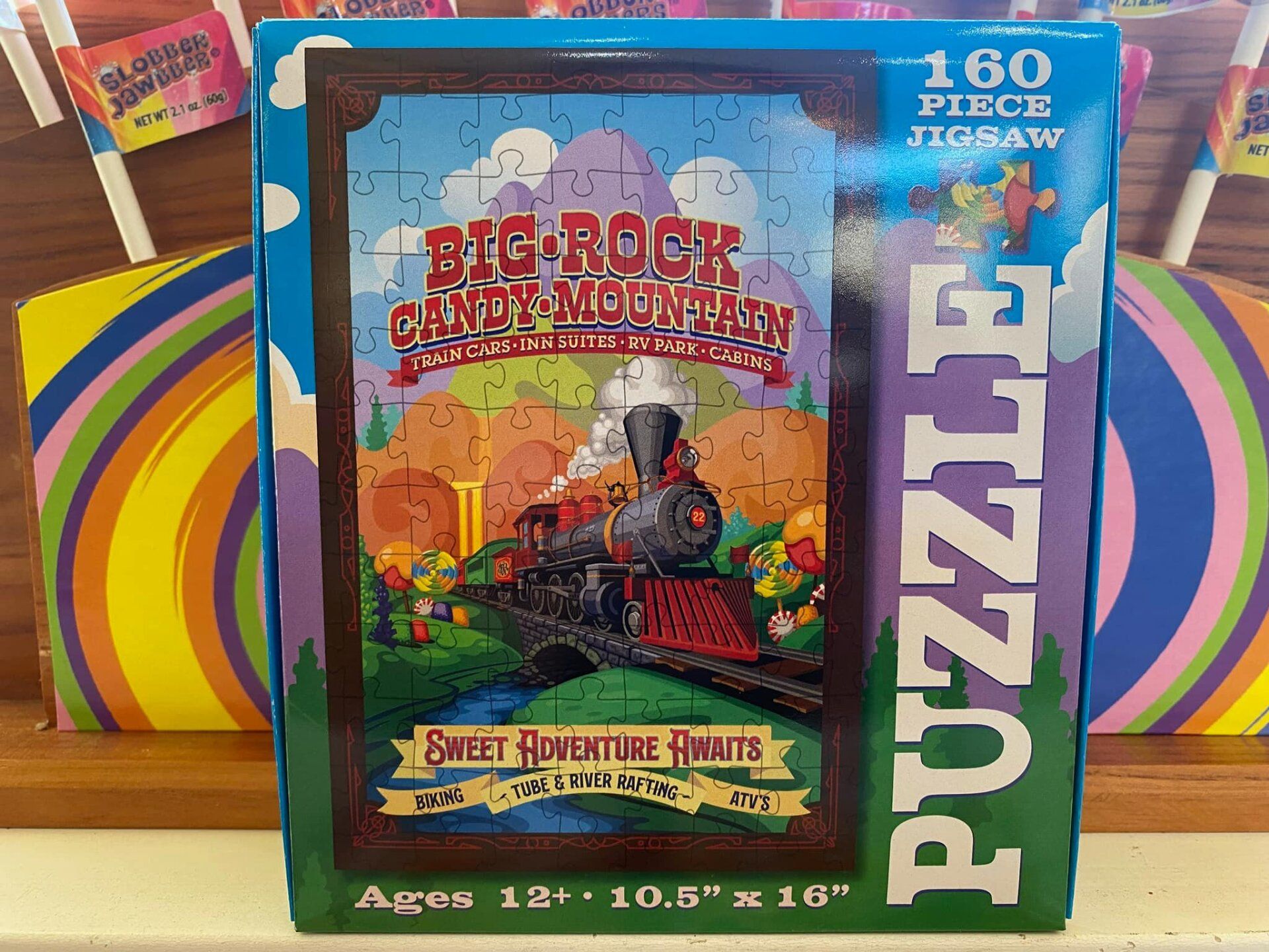 A 160 piece puzzle with a picture of a train on it