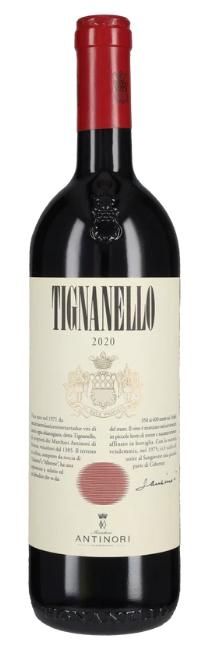 Una bottiglia di vino rosso Tignanello 2020, con tappo rosso ed etichetta con il nome del marchio.