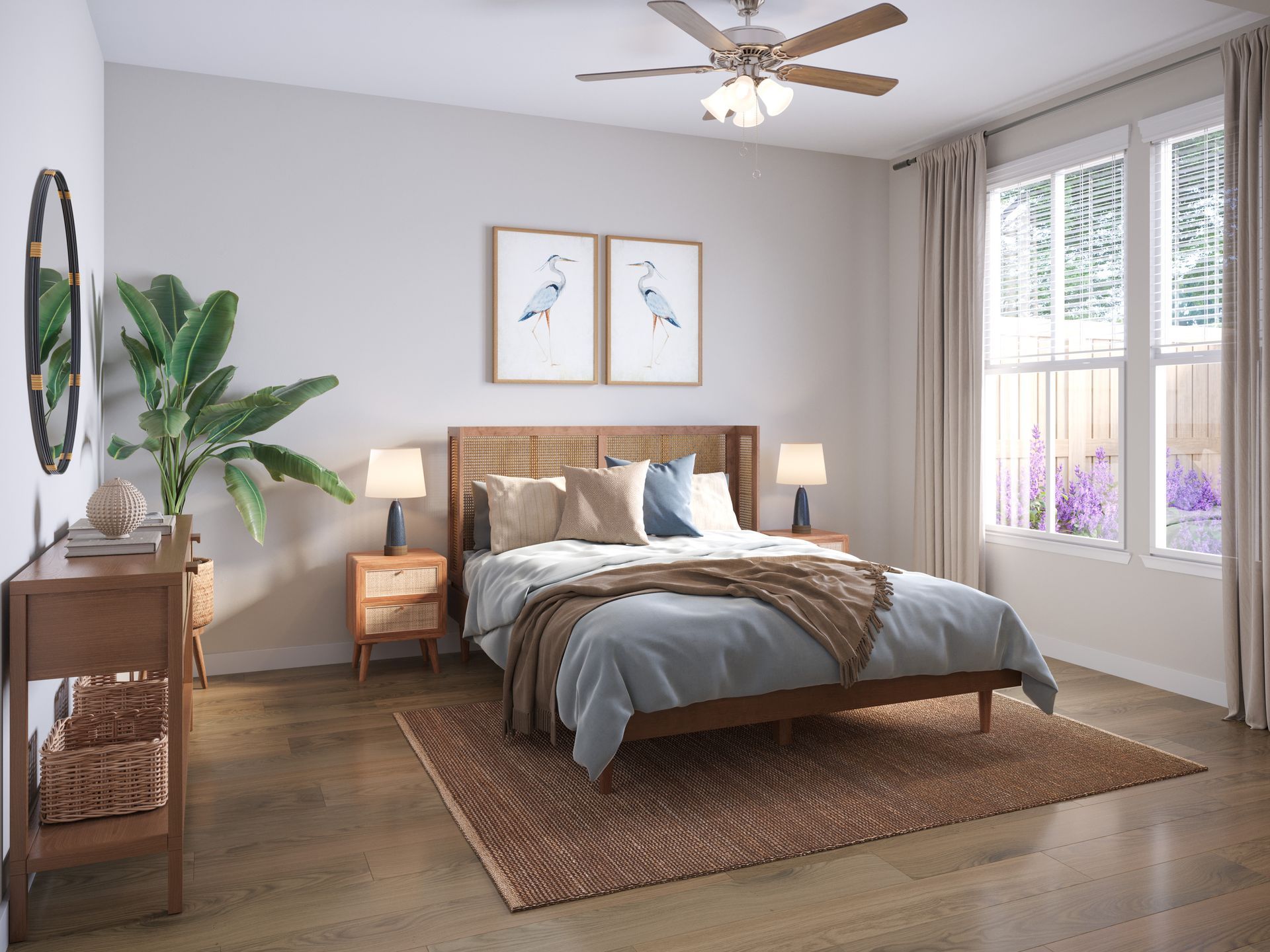 A bedroom with a wooden bed, blue bedding, two bedside tables with lamps, a plant, and a large window with beige curtains.