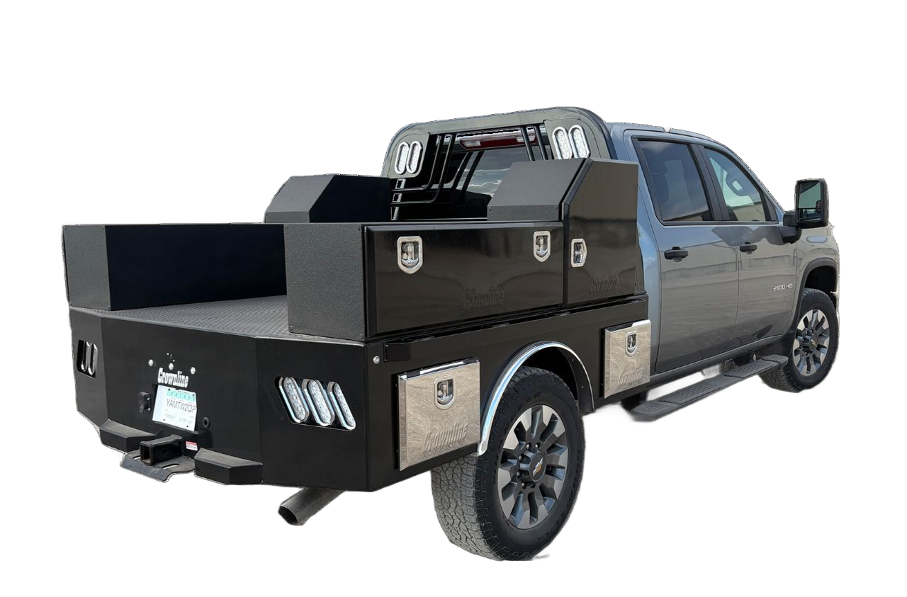 Black flatbed truck with service bed boxes, on a white background.