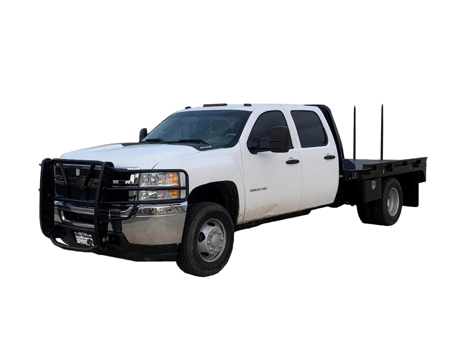 Photo of truck with spike bed hay bale bed front view