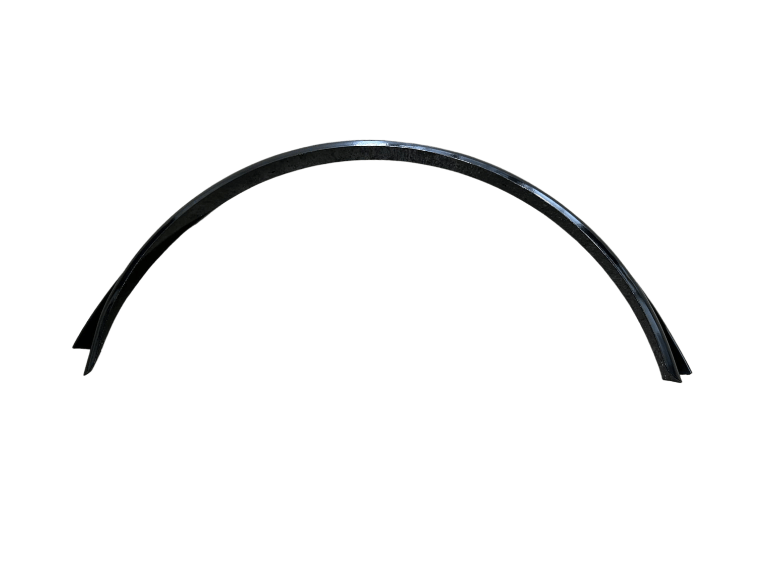 a black fender is sitting on a white surface .