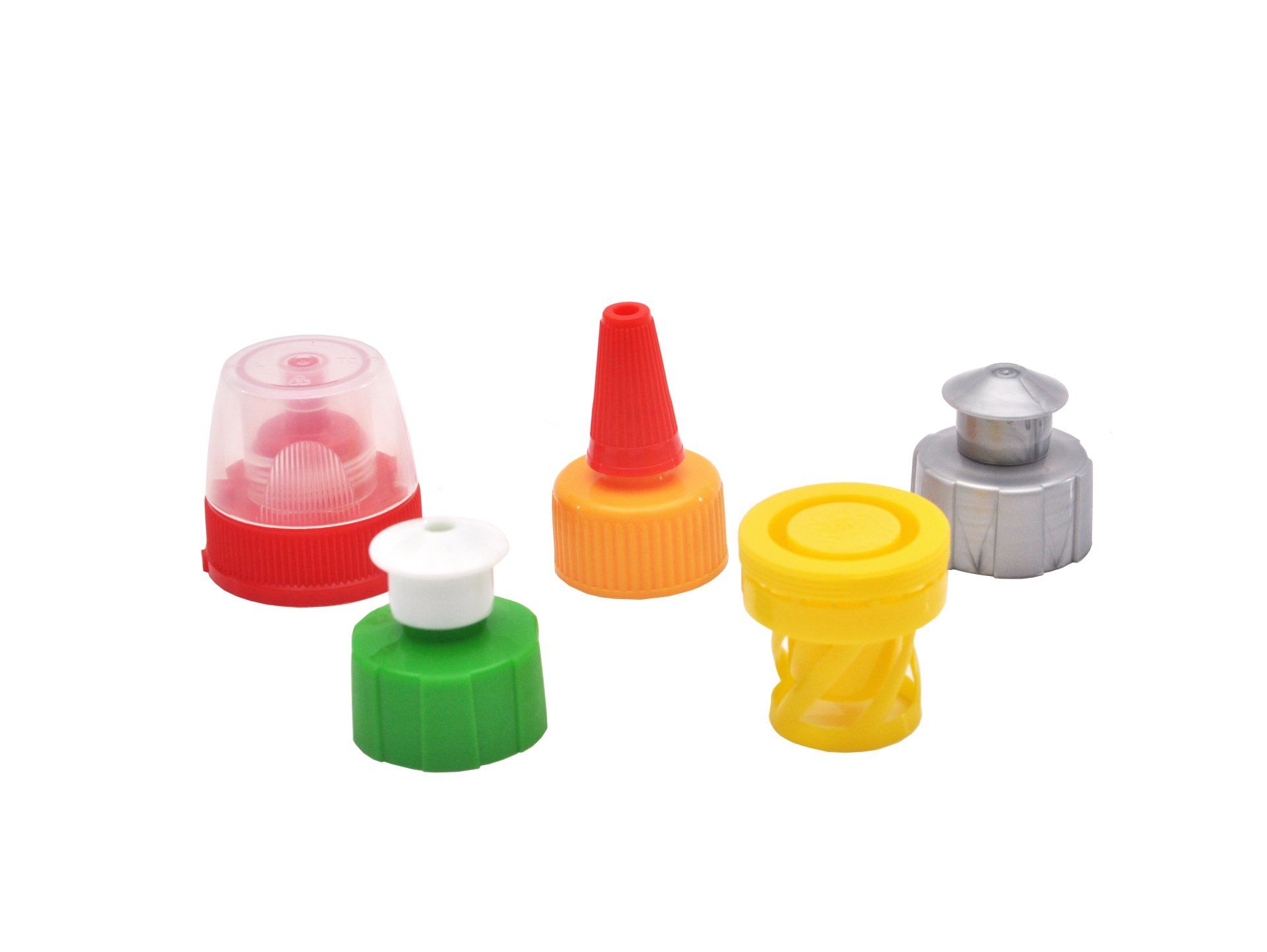 There are many different types of plastic caps on a white background.