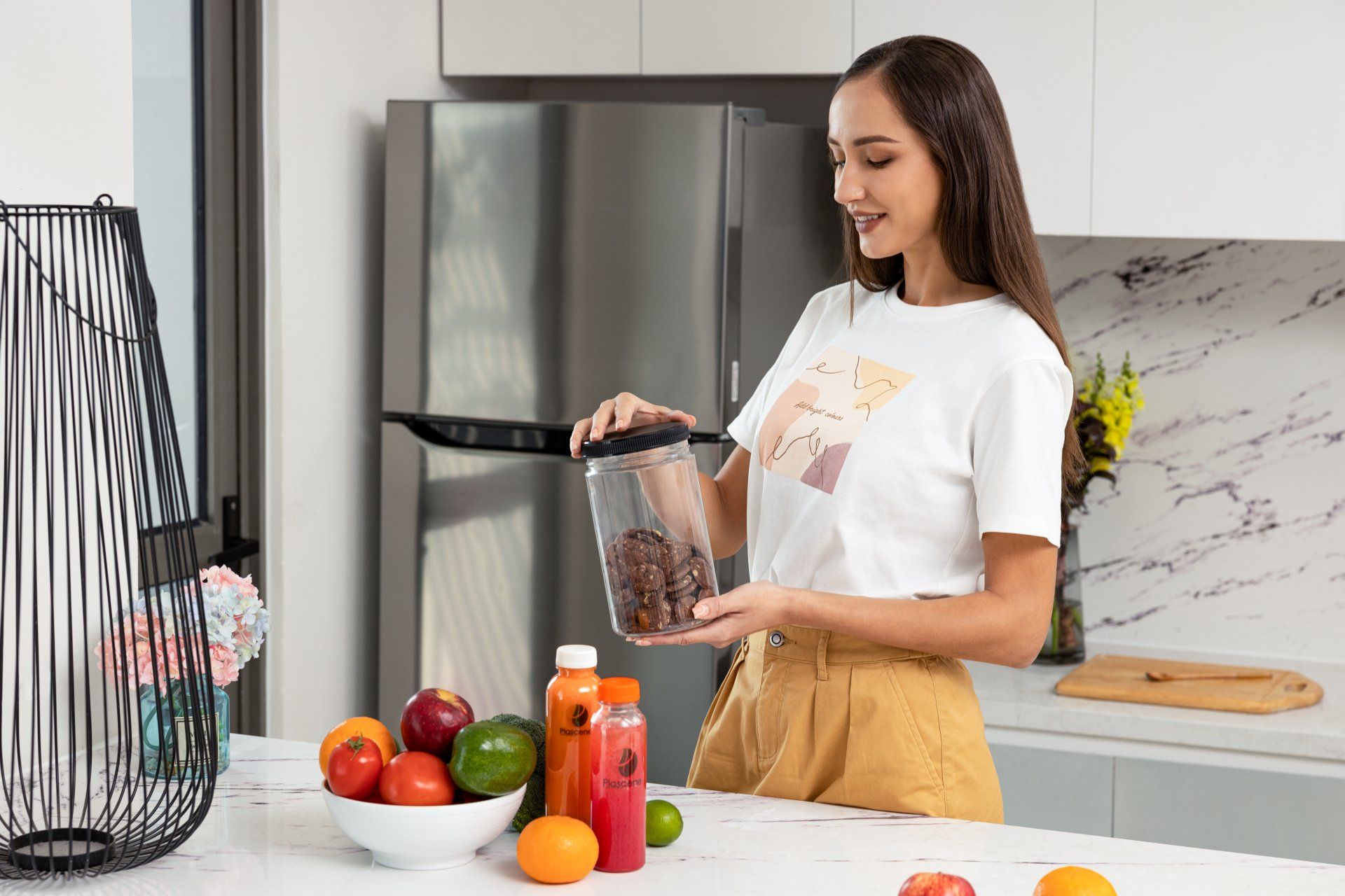 woman holding jar of cookies