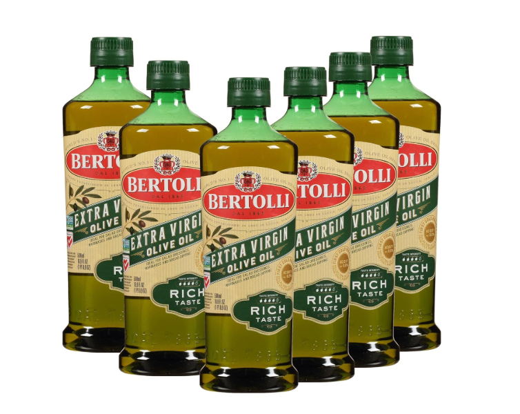 A group of bottles of Bertolli extra virgin olive oil