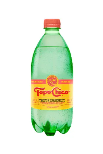 A bottle of topo chico on a white background