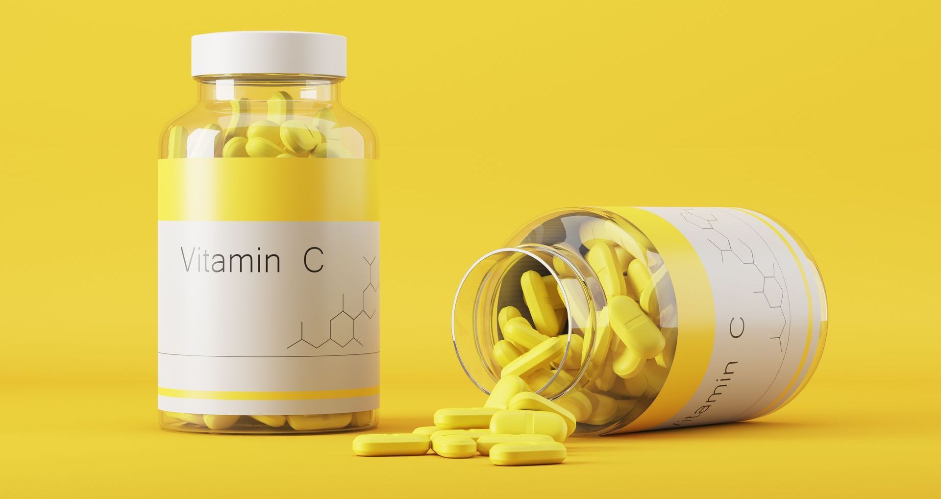 A bottle of vitamin c and a jar of pills on a yellow background.