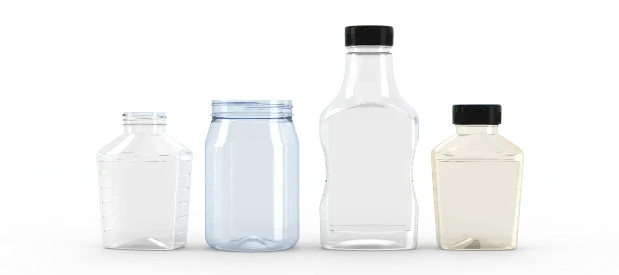 A group of plastic bottles are lined up next to each other on a white background.