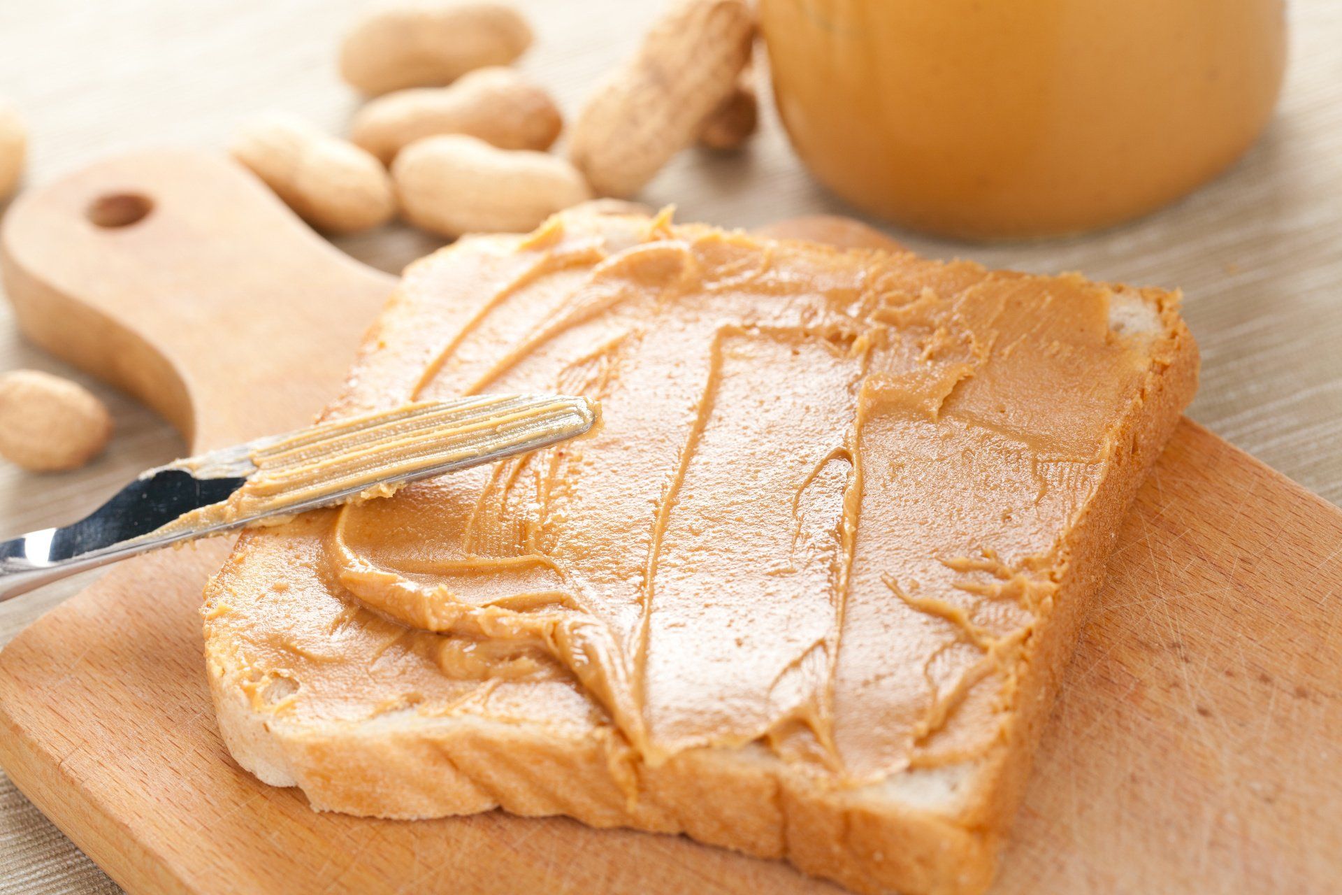 Peanut butter spread on bread.