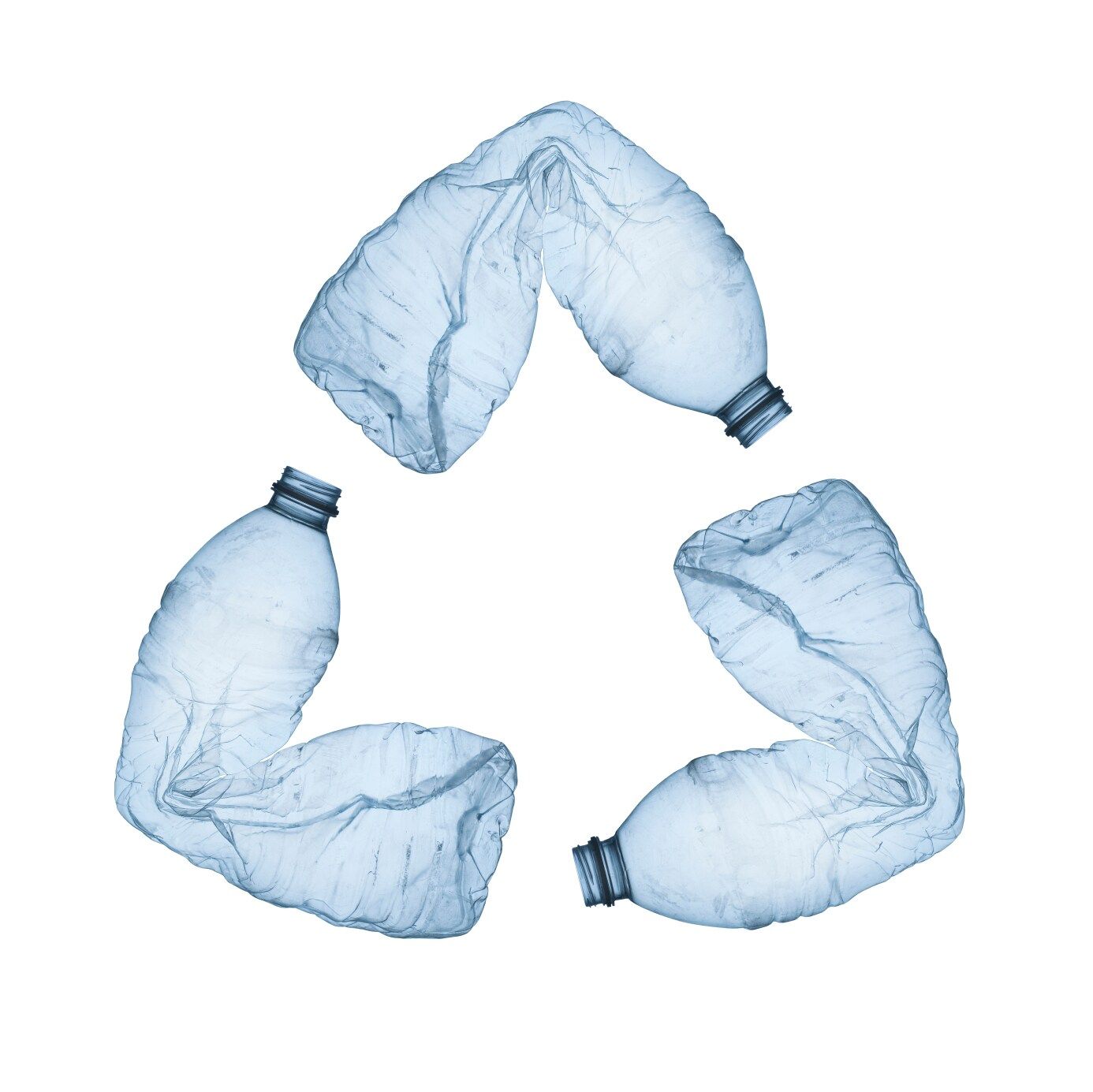 Recycle symbol formed from PET/rPET plastic bottles.