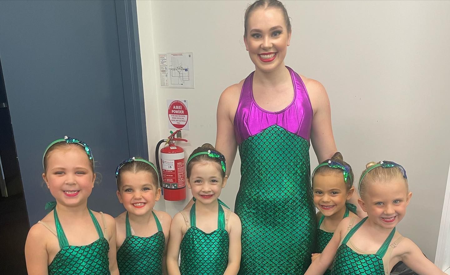Woman in Mermaid Costume With Six Children in Matching Costumes — Kay Flynn Dancing Academy Southport in Southport, QLD