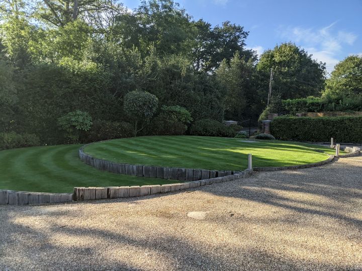 Tiered garden with gravel driveway