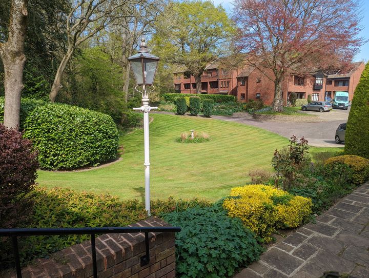 Communal garden with topiary and seasonal plants