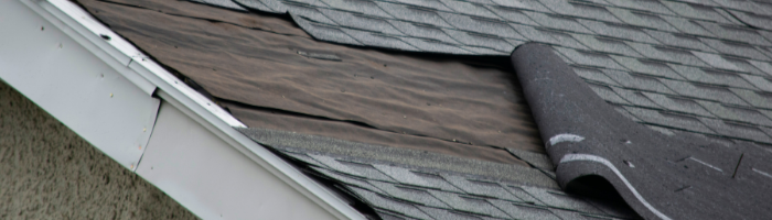 roof with shingles peeling off