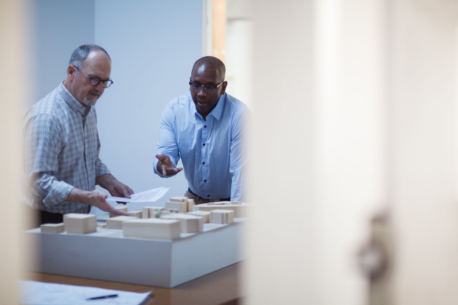 An aerial view of a residential area with lots of houses and trees.