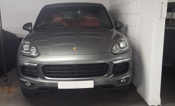 a grey Ferrari car