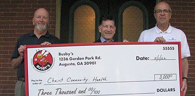 Busby’s Cares Community Contribution Check